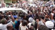 Kamil Idris inspects Omdurman market and addresses crowd on Wadi Street